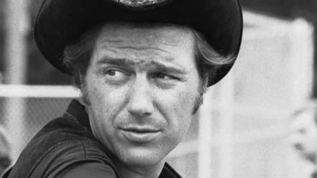 Jerry Jeff Walker wearing black hat