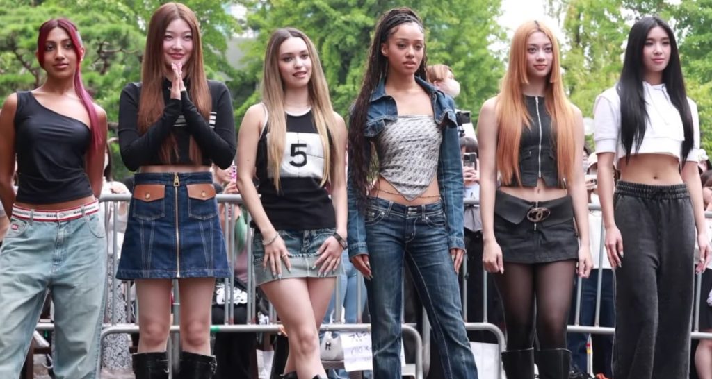 Six women lineup on stage