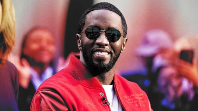 Diddy wearing red jacket