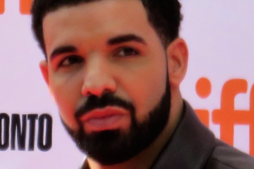 Drake looking concerned in press photo