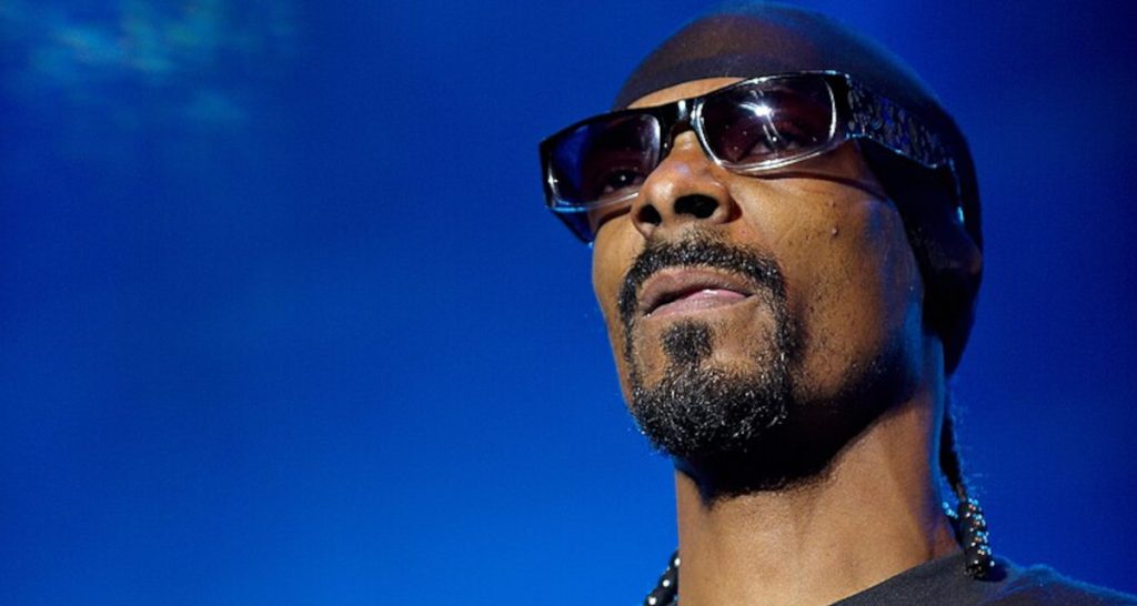 Snoop Dogg in sunglasses and bandana