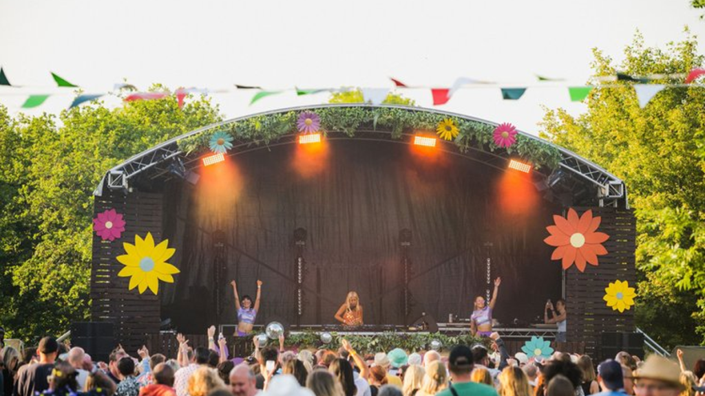 Festival stage with cancelled event banner