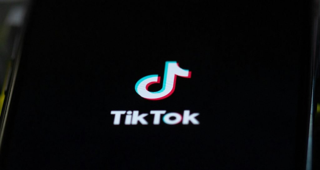 TikTok logo on dark background