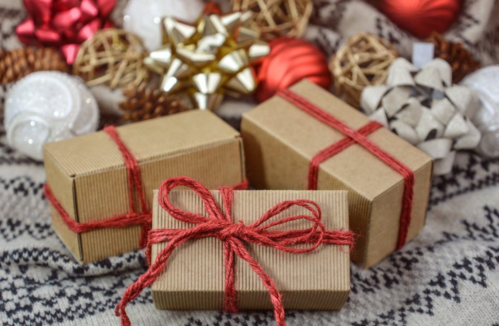 Christmas presents under decorated tree