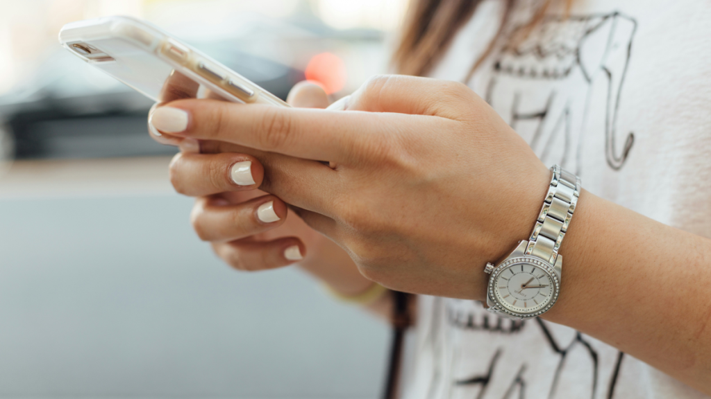 Woman on phone browsing content