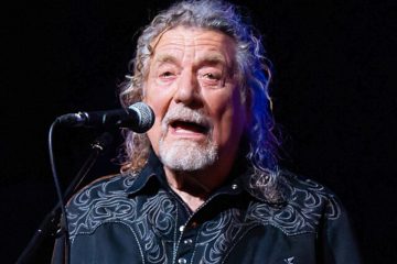 Robert Plant singing into microphone