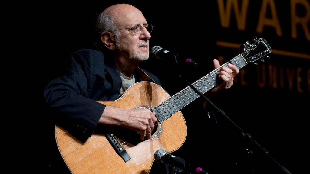 Peter Yarrow performing with acoustic guitar