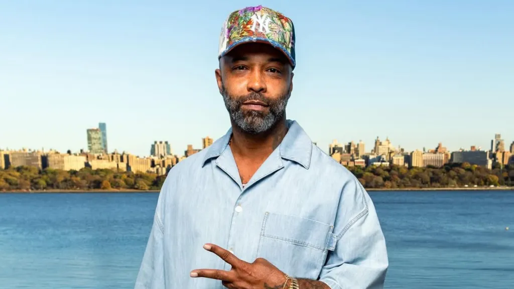 Joe Budden speaking with Yankees cap