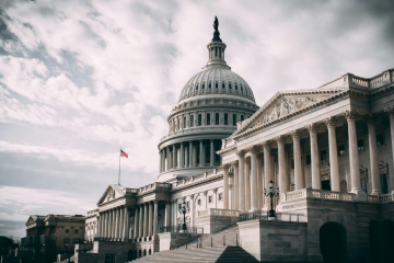 US Capitol building with American flag