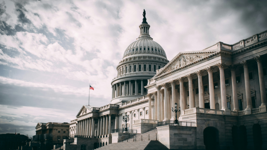 US Capitol exterior under clouds