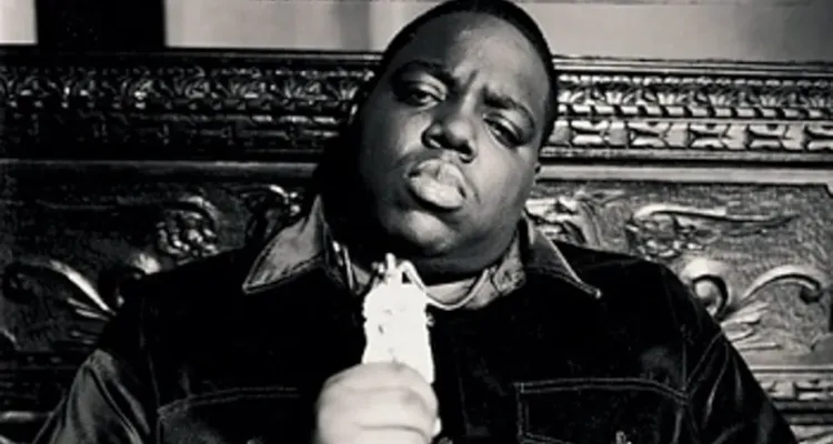 Notorious B.I.G. portrait against dark background