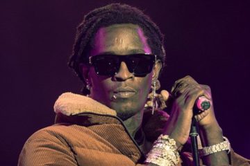 Young Thug wearing dark sunglasses